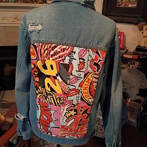 Blu[edit] 2026 Distressed Denim Jean Jacket ComicCon